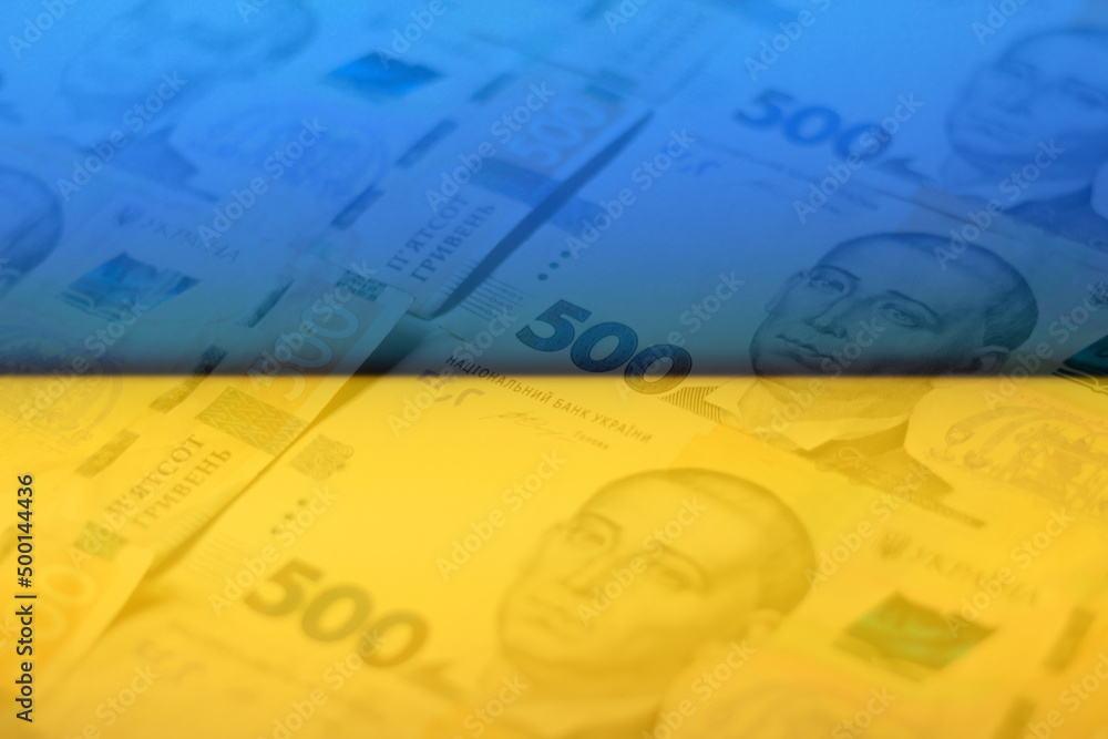 Defocus ukrainian money. Background of the five hundred hryvnia banknotes. Close-up view. Ukraine economic. Paper money. Ukraine flag. Out of focus Defocus ukrainian money. Background of the five hundred hryvnia banknotes. Close-up view. Ukraine economic. Paper money. Ukraine flag. Out of focus