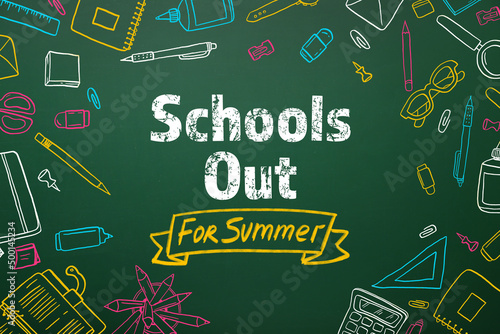 Text SCHOOL'S OUT FOR SUMMER written on chalkboard