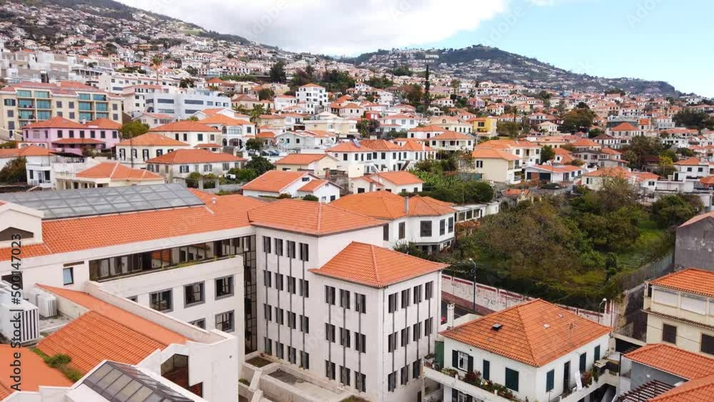 View from the cable car in Funchal. flying over buildings. View from the cable car in Funchal. flying over buildings.