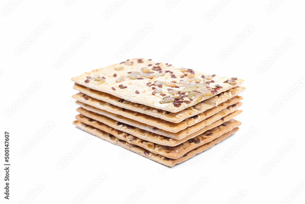 Multigrain crispbread with sesame, flax and sunflower seeds isolated on white background. Healthy snack Multigrain crispbread with sesame, flax and sunflower seeds isolated on white background. Healthy snack