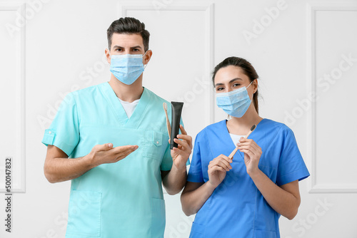 Dentists in medical masks h...