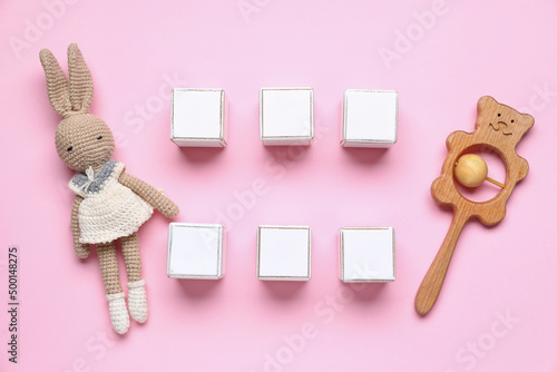 Wooden cubes with baby toys...