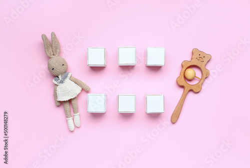 Wooden cubes with baby toys...