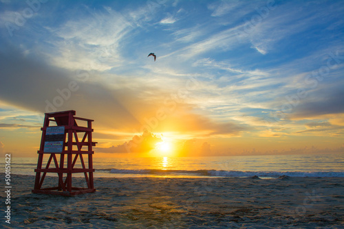 Sunrise at the beach in Cocoa Beach, Florida near Cape Canaveral. Brevard County also known as the Space Coast.  photo