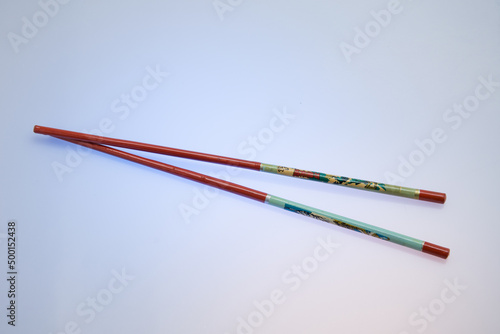 Old Asian chopsticks isolated 