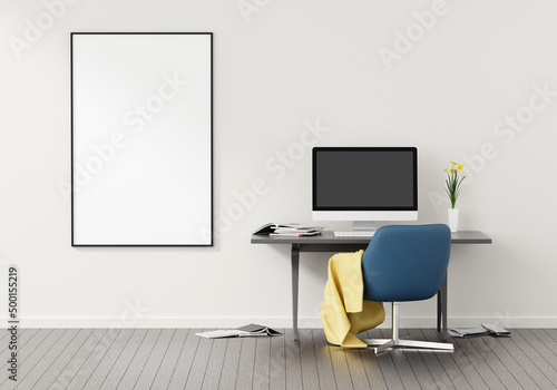 Blank computer screen and various items on desktop workspace with picture frame in home office room. 3D renering illustration.