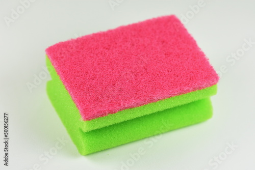 A  green Kitchen Sponge Isolated On The White Background 