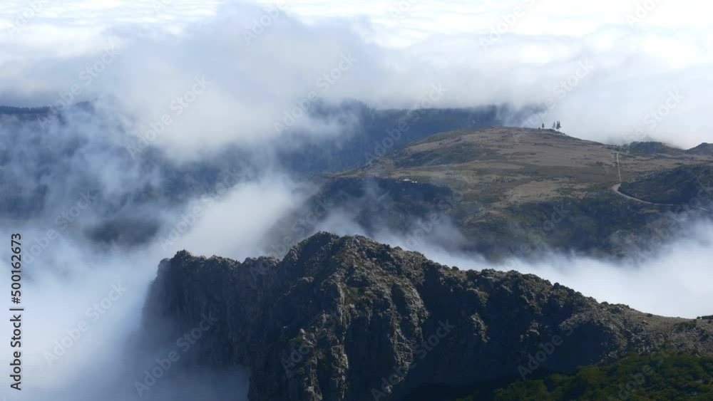 Clouds and sunlit rocky mountains, Madeira Clouds and sunlit rocky mountains, Madeira