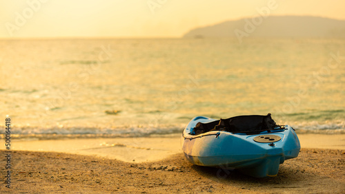 Empty kayak boat on tropical island beach at summer sunset © CandyRetriever 