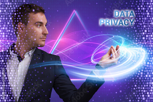 Business, Technology, Internet and network concept. Young businessman working on a virtual screen of the future and sees the inscription: Data privacy