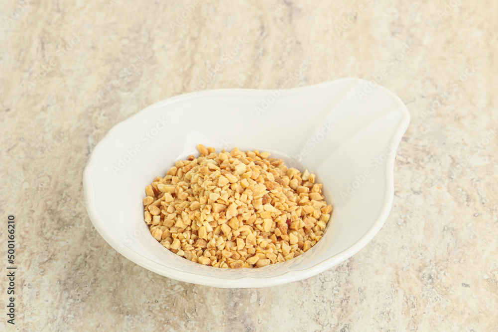 Crunched roasted peanut in the bowl Crunched roasted peanut in the bowl