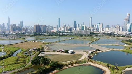 Shenzhen skyline mainland China as seen from Hong Kong Lok Ma Chau village area. photo