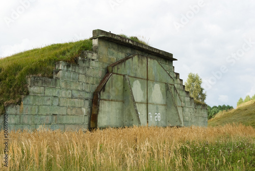 Abandoned cold war Soviet era concealed military aircraft hangar, Mimoň, Czech Republic photo