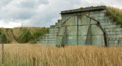 Abandoned cold war Soviet era concealed military aircraft hangar, Mimoň, Czech Republic photo