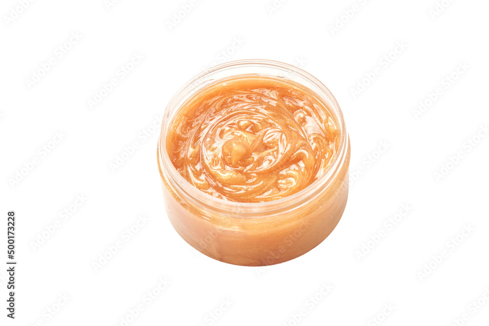 Face scrub smear texture. Cream skincare cosmetic in round jar. Organic stroke. Feet oily cleanser smudge. Particles in gel. White background. Top view. Yellow and black fluid treatment Face scrub smear texture. Cream skincare cosmetic in round jar. Organic stroke. Feet oily cleanser smudge. Particles in gel. White background. Top view. Yellow and black fluid treatment