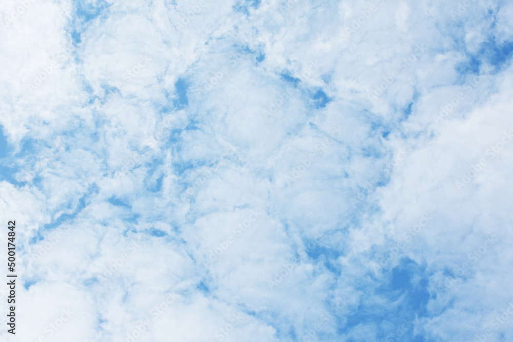 Blue sky scenery with white fluffy clouds for the background.