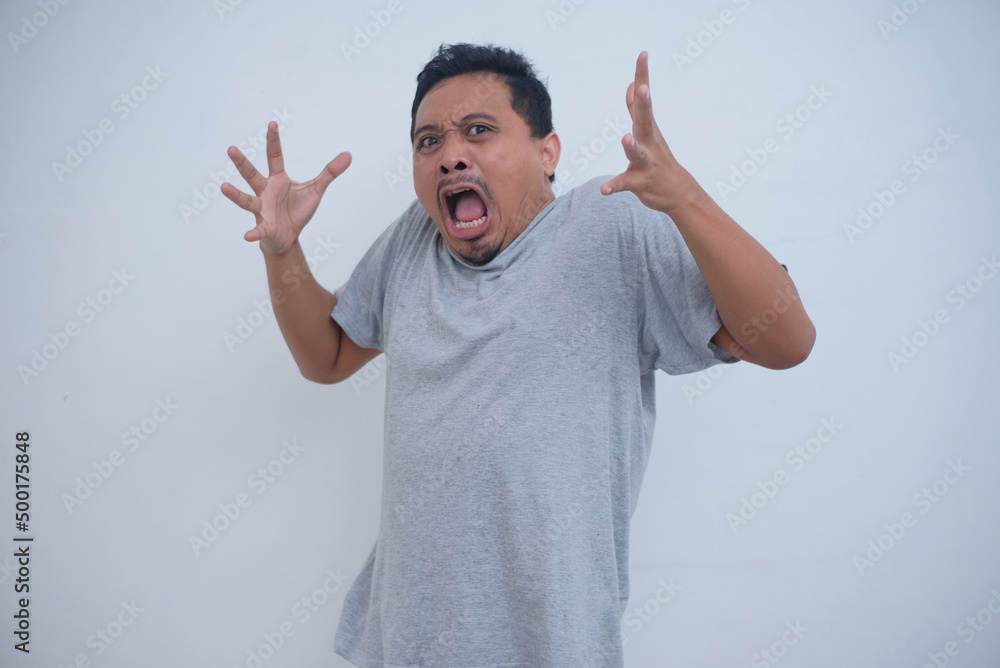 Fototapeta premium frightened man with funny face expression