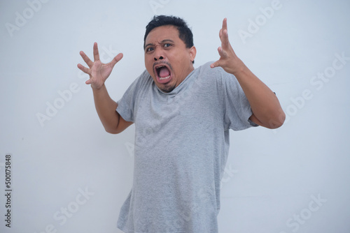 frightened man with funny face expression
