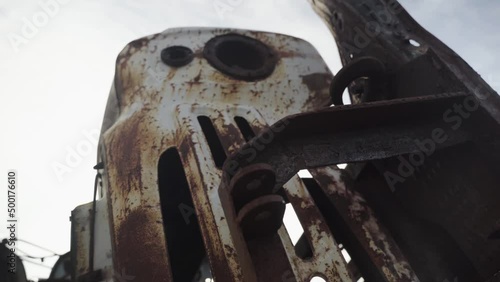 Abandoned rusty radioactive equipment of the soviet union. Cemetery of technology in Rassokha. Chernobyl. Ukraine photo