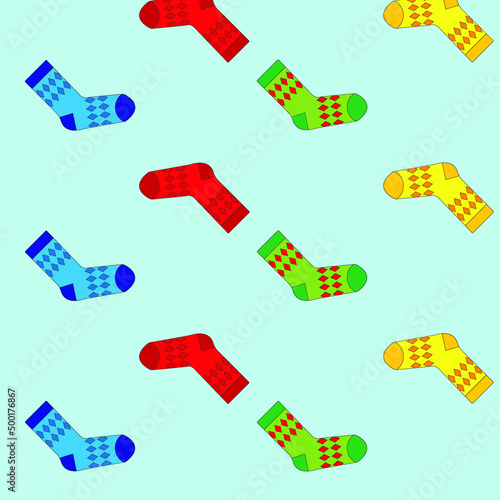 Multicolored socks on a blue background. Socks are scattered 