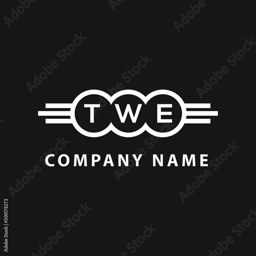 TWE letter logo design on black background. TWE  creative initials letter logo concept. TWE letter design. photo