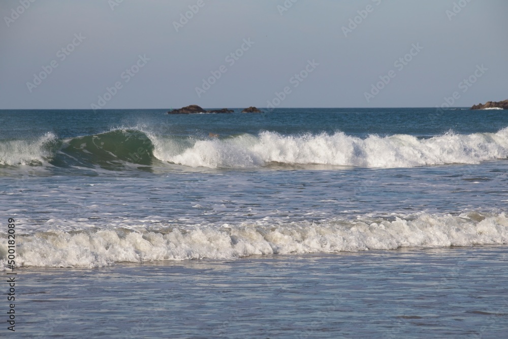 waves crashing on the beach