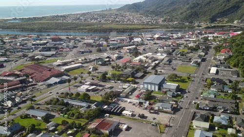 Beautiful aerial panorama of Greymouth located on West Coast. Sunny day at New Zealand shore. photo