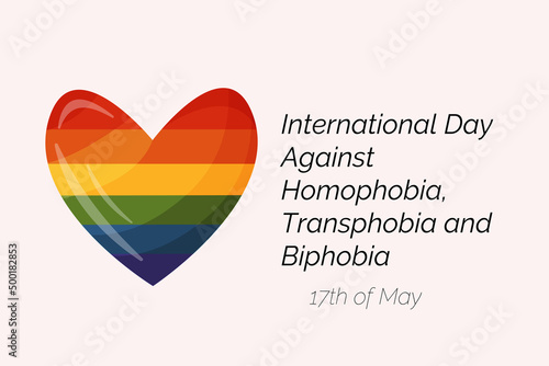 International Day Against Homophobia, Transphobia and Biphobia. May 17. Stop Homophobia. Heart with rainbow LGBT flag on light pink background.
