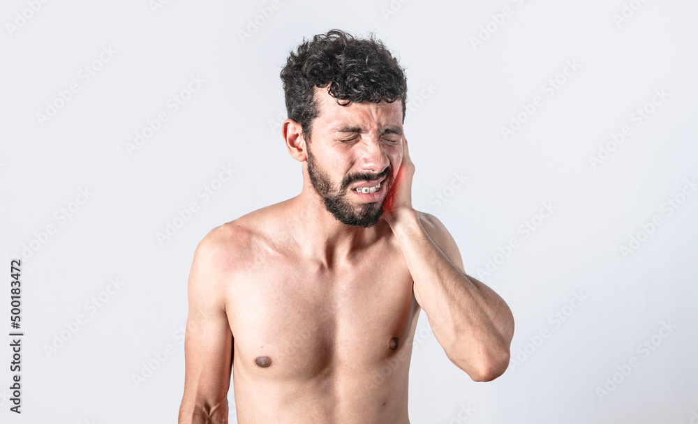Fototapeta premium Person with earache on isolated background, man with earache on isolated background, ear disease concept