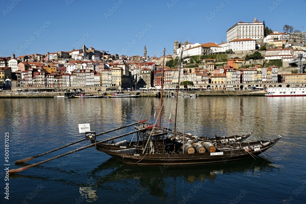 Porto panoramic view and traditional port wine transport boat on the Douro - Portugal 