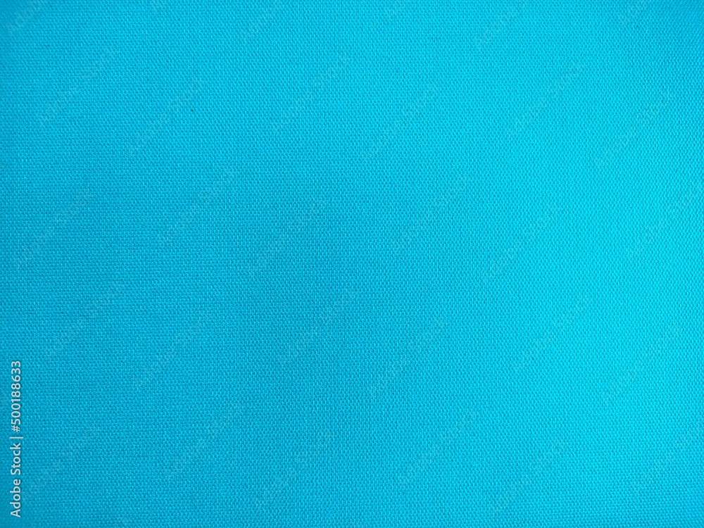 Texture canvas painted light blue background, surface canvas painted light blue as background. Texture canvas painted light blue background, surface canvas painted light blue as background.