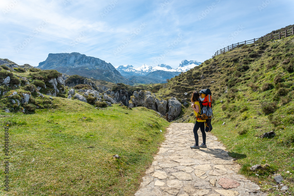 A mother with her son in the Buferrera mines in the Covadonga lakes. Asturias. Spain