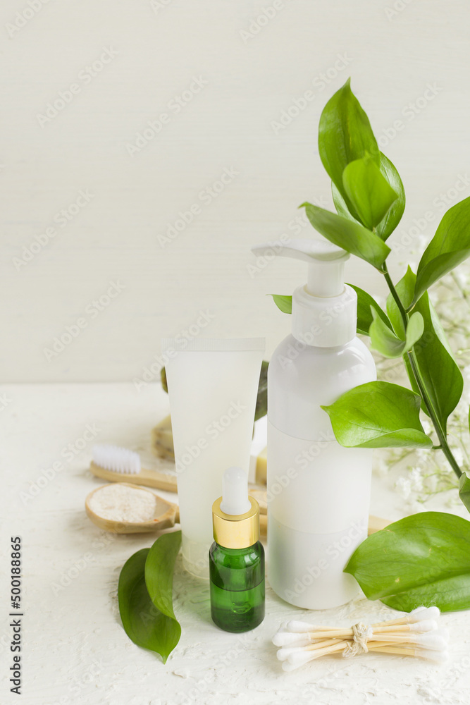 Eco cosmetic products for skin care of face and body. White tubes with natural creams, soap, and bottle with essence oil, and other cosmetic products with minerals, vitamins, prebiotics Eco cosmetic products for skin care of face and body. White tubes with natural creams, soap, and bottle with essence oil, and other cosmetic products with minerals, vitamins, prebiotics