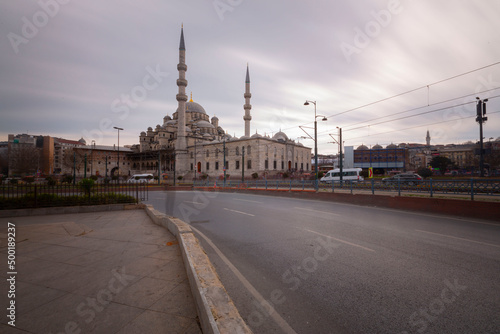 Beautiful view of the area of Eminönü in the Fatih district on the Golden Horn with Süleymaniye Mosque on a cloudy day photo