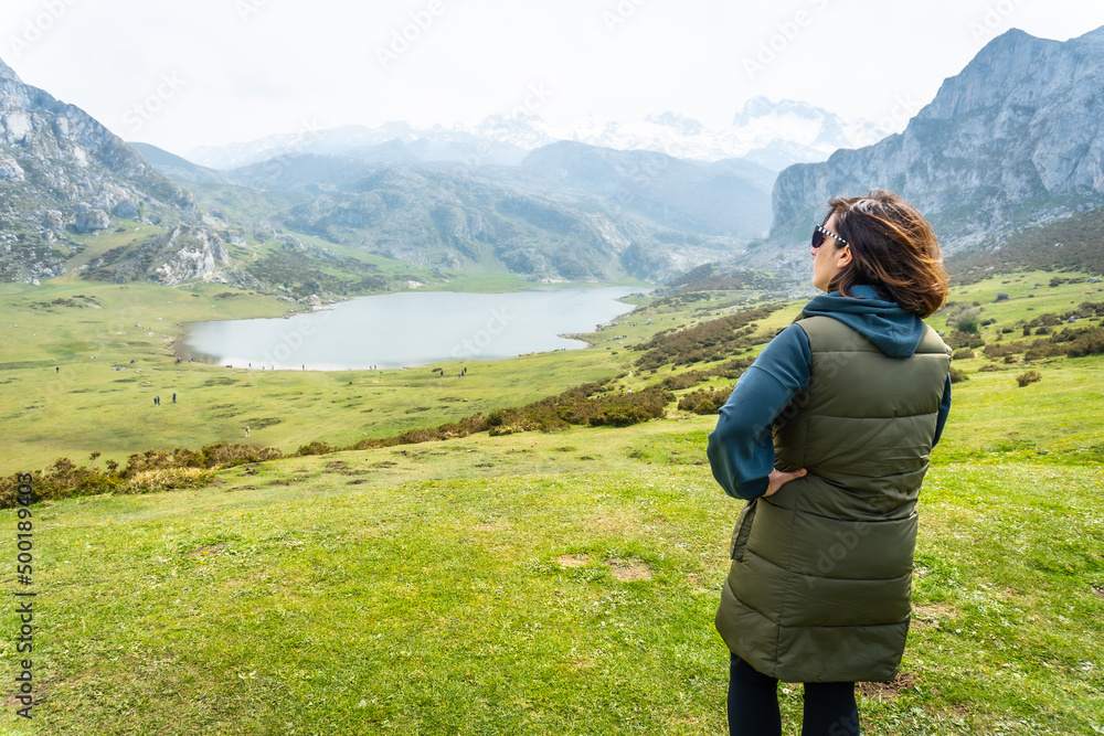 A young tourist at the Entrelagos viewpoint of Lake Ercina in the Lakes of Covadonga. Asturias. Spain