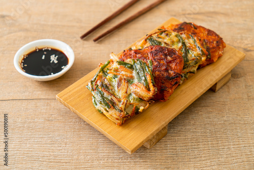 Pajeon or Korean pancake and Korean Kimchi pancake or Kimchijeon on white background