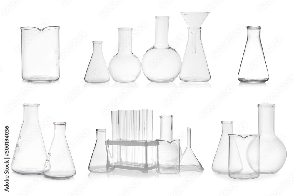 Set of different empty laboratory glassware on white background