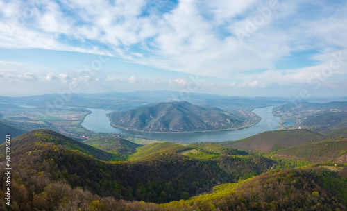 Spectacular panoramic view of danube bend from Prédikálószék lookout point. This region of Hungary is touristically very significant. Dömös and Visegrád at the background. Spring landscape. photo