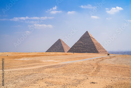 The impressive pyramids of Cheops and Kefren with the city of Cairo in the background. Photograph taken in Giza  Cairo  Egypt.