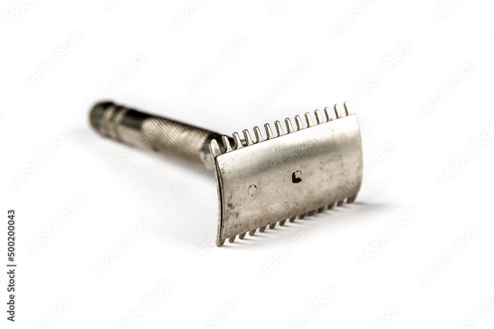Fotografie Old vintage shaver isolated on a white background