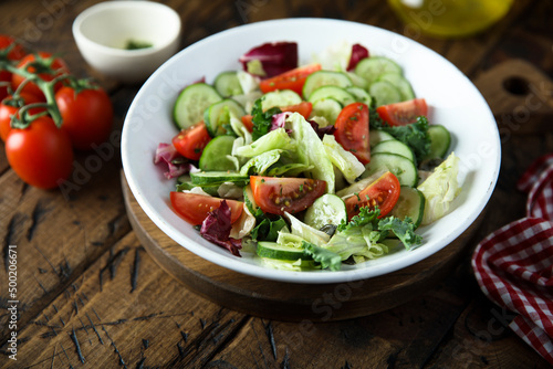 Healthy green salad with tomato and cucumber © marysckin