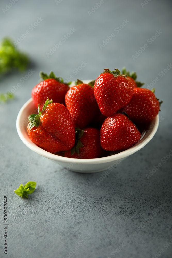 Fresh ripe strawberry in a white bowl Fresh ripe strawberry in a white bowl
