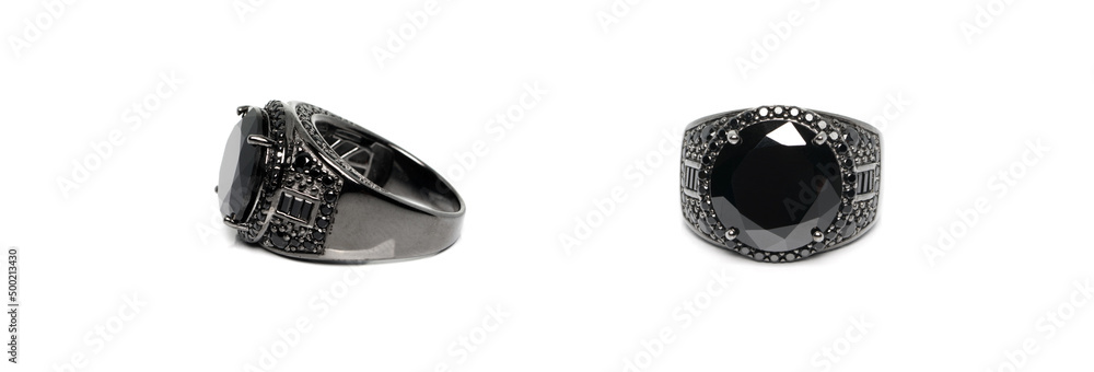 Blackened silver ring with black Spinel on white background with reflection. Collection of natural gemstones accessories. Studio shot Blackened silver ring with black Spinel on white background with reflection. Collection of natural gemstones accessories. Studio shot