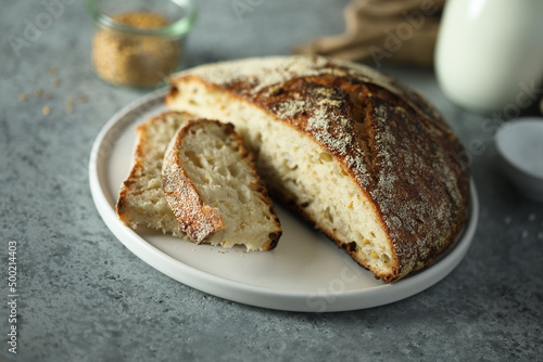 Healthy artisan bread on a table © marysckin