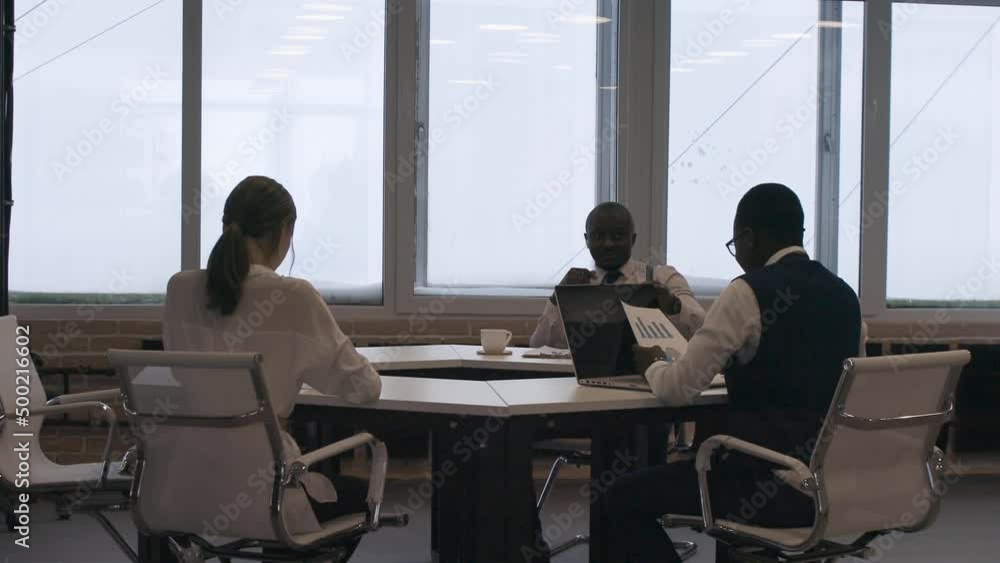 Business meeting of business partners in the office in the meeting room. Business meeting of business partners in the office in the meeting room.
