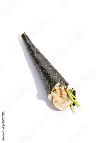 Japanese temaki sushi with shrimp, avocado and spicy sauce on white background. Hand roll with prawn and avocado in minimalistic style. Handroll in asian style