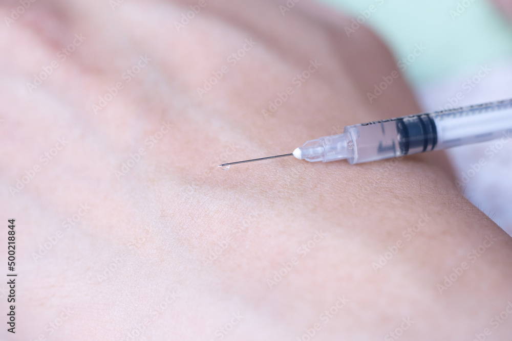 Vaccination to treat illness<The patient is being vaccinated to treat his illness. Vaccination to treat illness<The patient is being vaccinated to treat his illness.