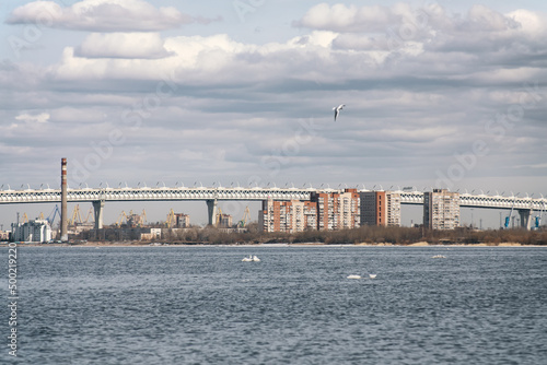 St Petersburg, Russia-April 2022: View of Western high-speed diameter crossing the residential district on Kanonersky island. Gulf of Finland