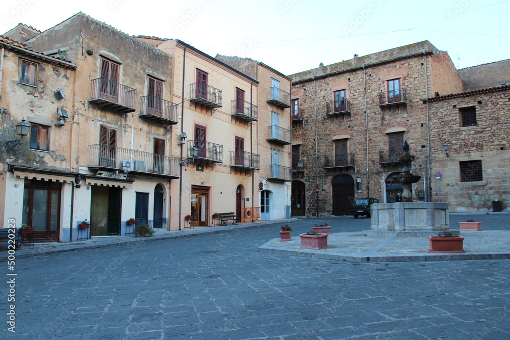 square and ancient buildings (houses or flat buildings) in castelbuono in sicily in italy 