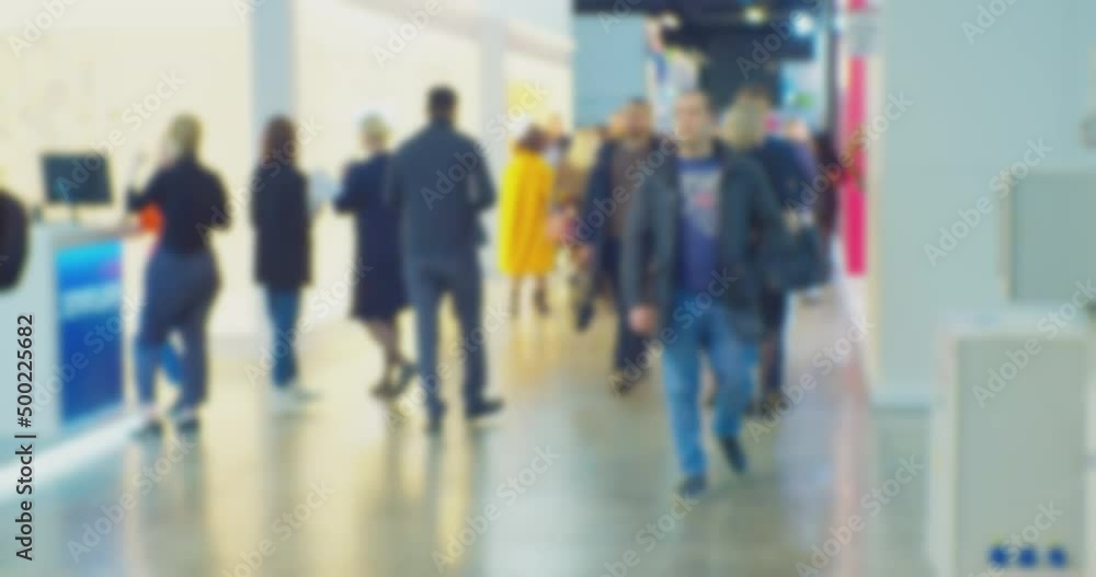 timelapse. modern business life. defocused blurry video. background on the theme of business. blurred silhouettes of unrecognizable people walking in a large hall. timelapse. modern business life. defocused blurry video. background on the theme of business. blurred silhouettes of unrecognizable people walking in a large hall.